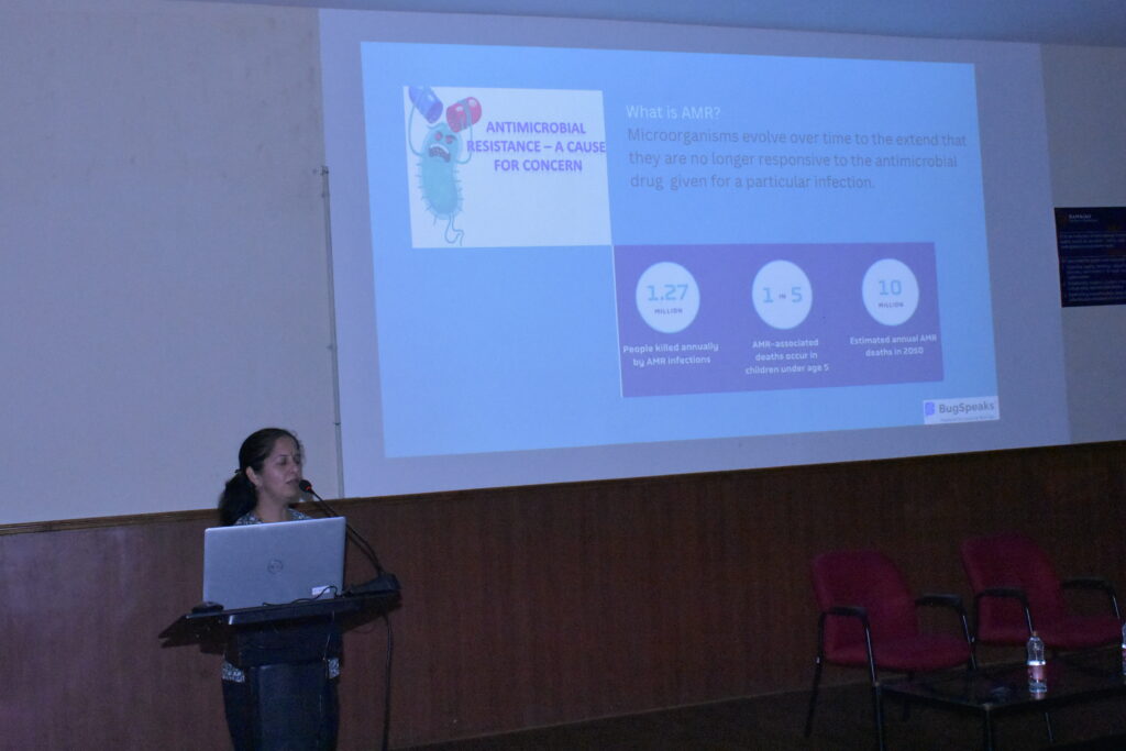 Speaker on stage at an IBioM monthly meet